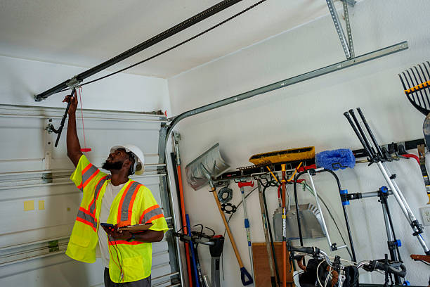 Professional Garage Door Panel Replacement technician working in Winfield, IN